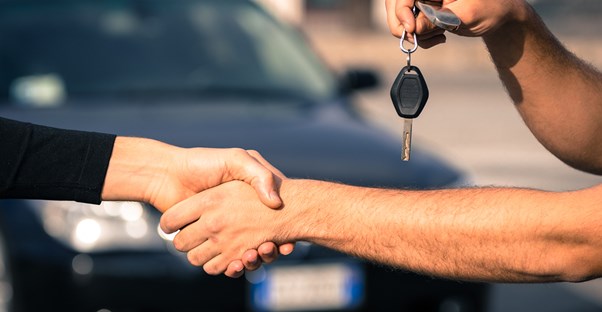 Transfer of keys to a car that was bought at an auction