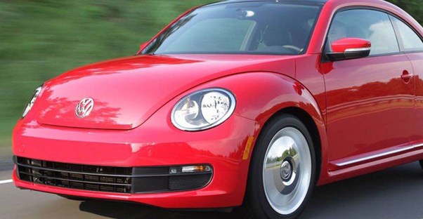 a red volkswagen beetle