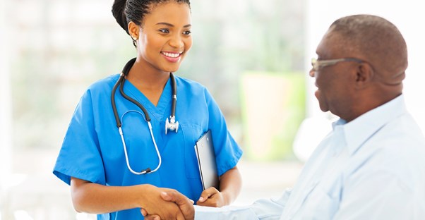 A medical professional explains what a nurse practitioner is to a new patient.