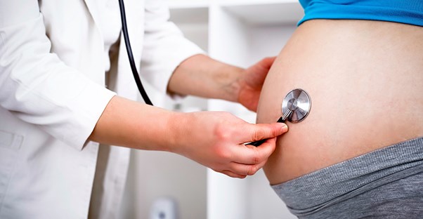 A pregnant woman is examined