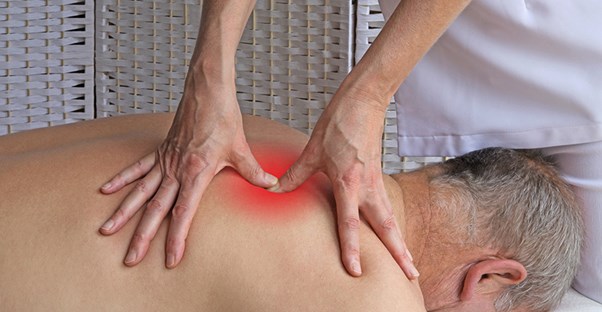 man receiving trigger point therapy
