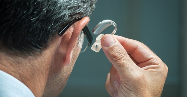 a man wearing a hearing aid