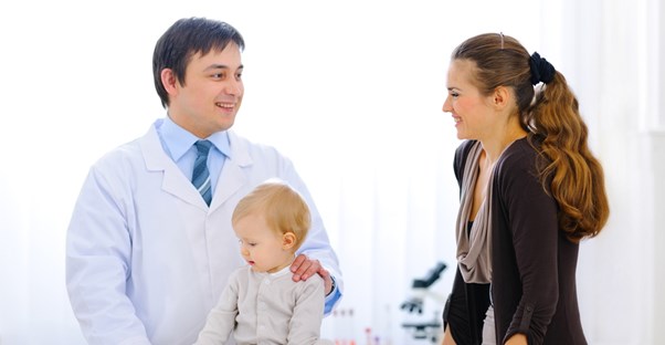 a doctor discussing a child's sickle cell anemia