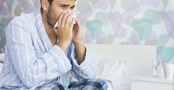 a man suffering from the common cold