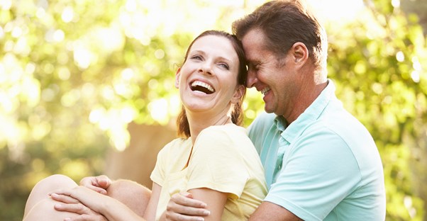 a couple laughing about erectile dysfunction remedies