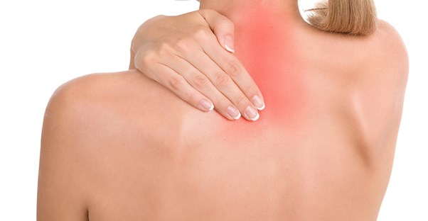 a woman experiencing neck pain