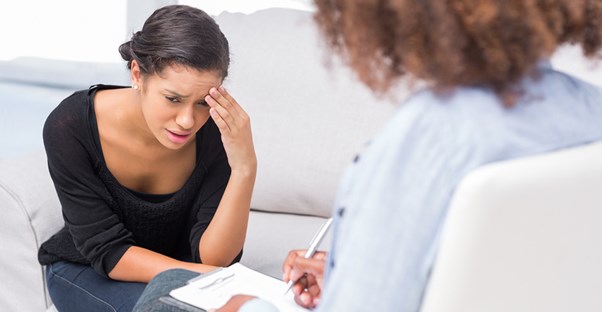 a woman taking a bipolar disorder quiz