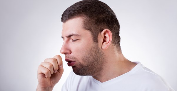 a man exhibits whooping cough symptoms