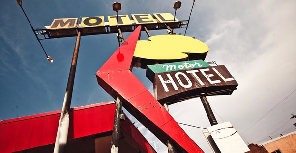 a sign for a motel along Route 66