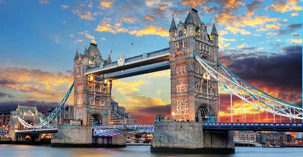 the tower bridge in london in front of a sunset