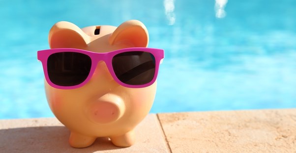 a piggy bank has saved money for travel to cuba
