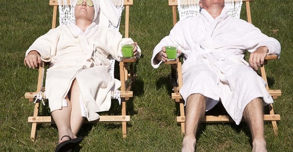 a man and a woman relax in the sun and enjoy their retirement