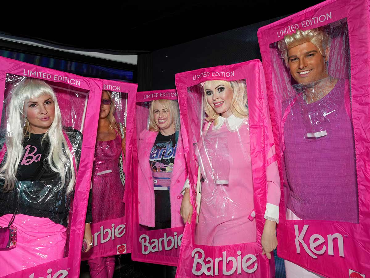 Rebel Wilson, Carly Steel, and Jacob Andreou as Barbies