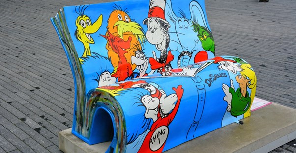 A bench painted in Dr. Seuss characters.