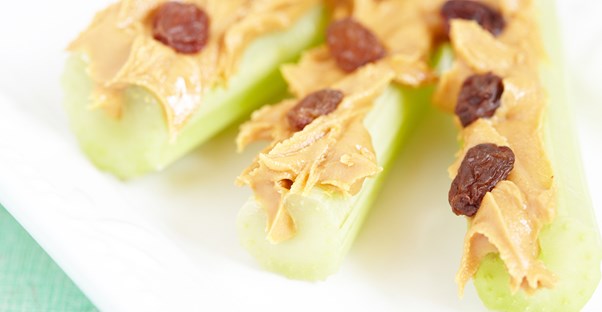 A healthy snack of celery and peanut butter given to a kid who hates healthy food.