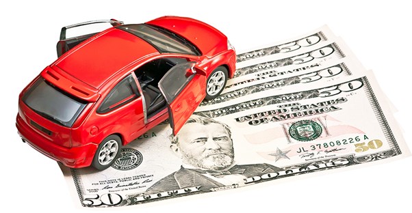 car on top of money