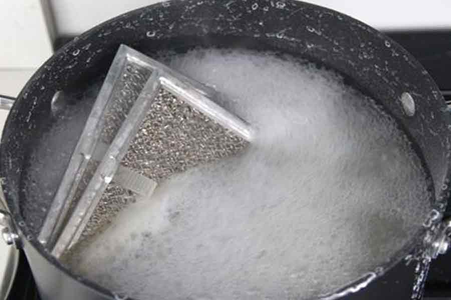 Clean the range hood and filters