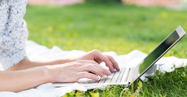 A girl using an energy efficient laptop