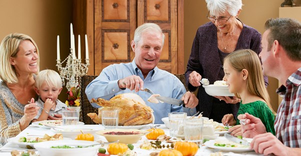 A family enjoying Thanksgiving dinner
