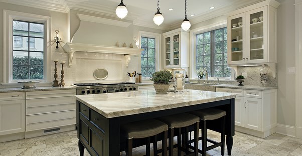 A kitchen with marble countertops