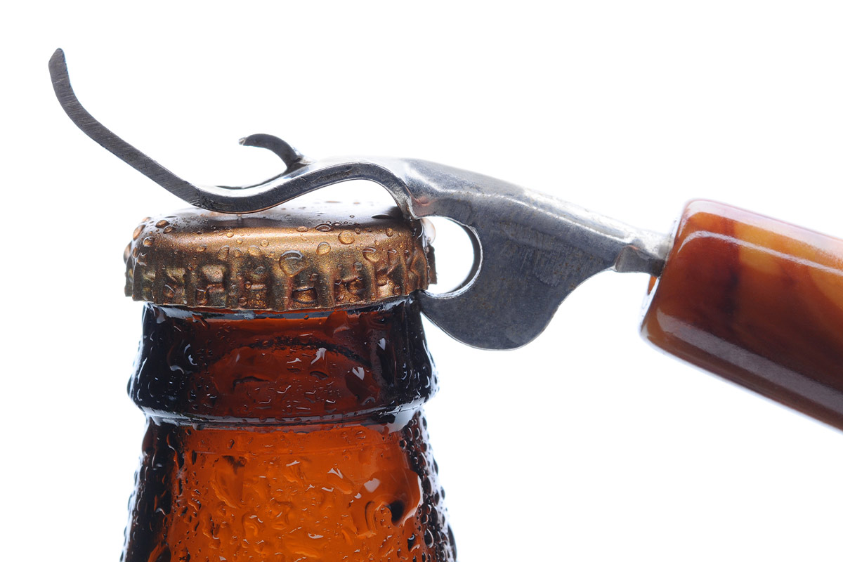An Engraved Corkscrew/Bottle Opener