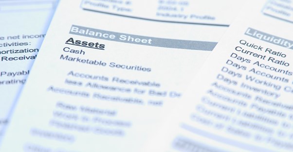 Close up of an asset balance sheet provided by an asset management firm