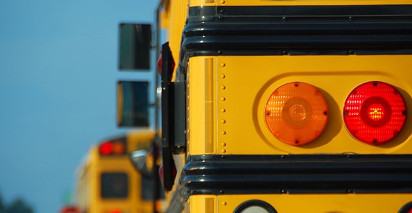 the tail lights of a school bus symbolizing a charter school