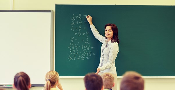 A teacher explains common core practices to her students