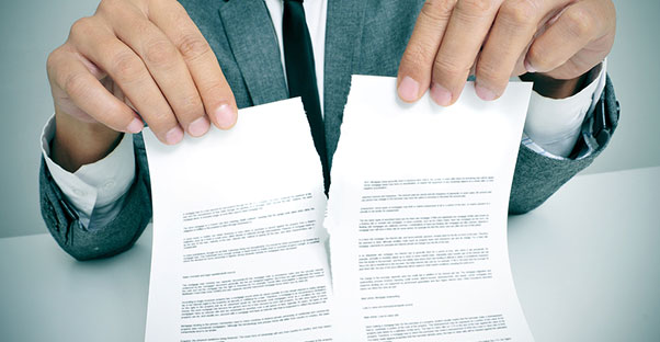 An attorney holding paperwork for a power of attorney
