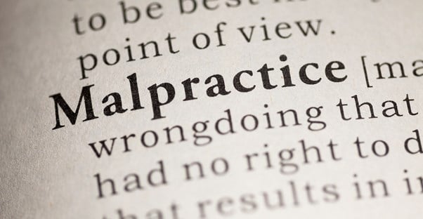 Malpractice highlighted in a dictionary page
