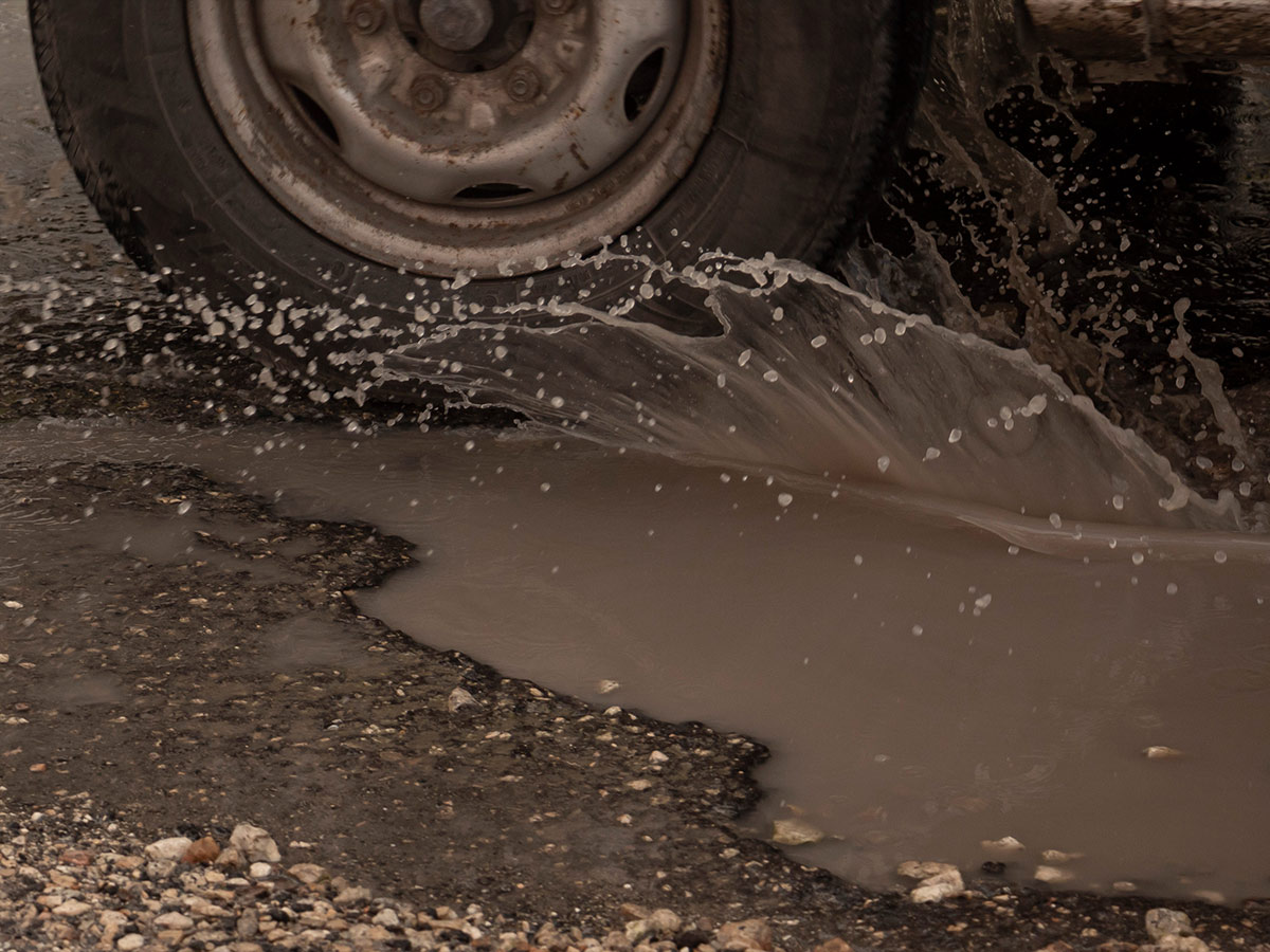 Driving Over Potholes