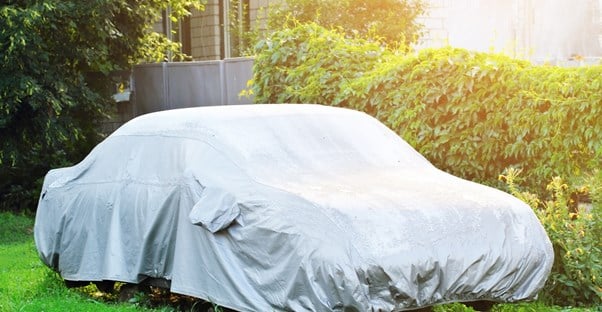 A weather resistant car cover on a car