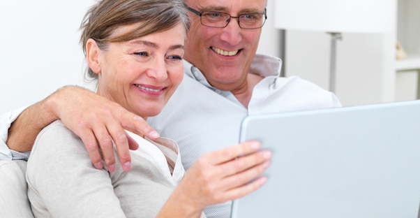 Retiring couple examining their 401k plans