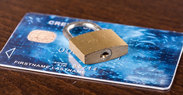 padlock on top of a credit card
