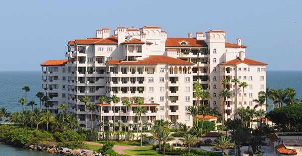 a condo building on the beach that offers timeshare rentals