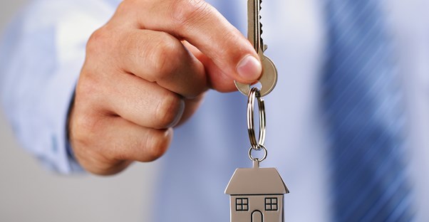 A lender holds the key to a potential new home.