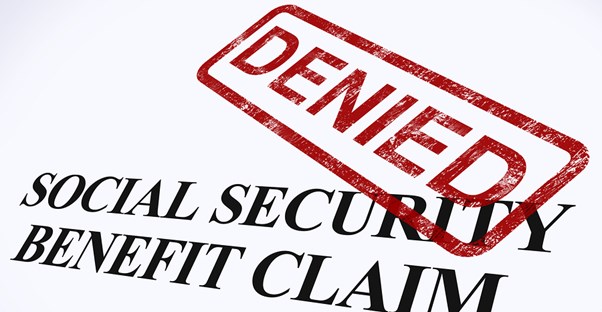 Red denied stamp on a social security disability claim