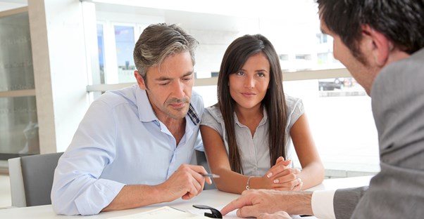 Couple examining loan options