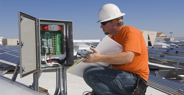 Electrical engineer working on a roof