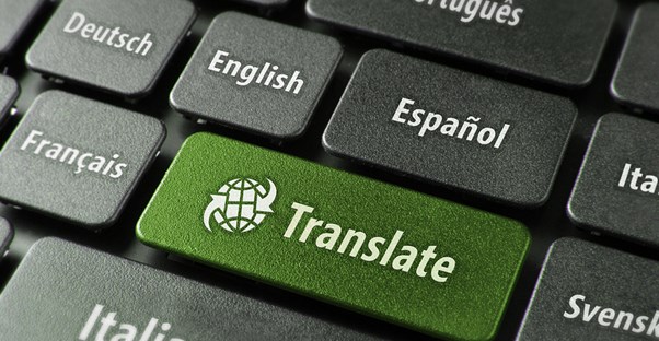 Green translate button on a keyboard