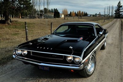 a black dodge challenger from the 1960s
