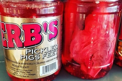 A jar of pickled pigs feet