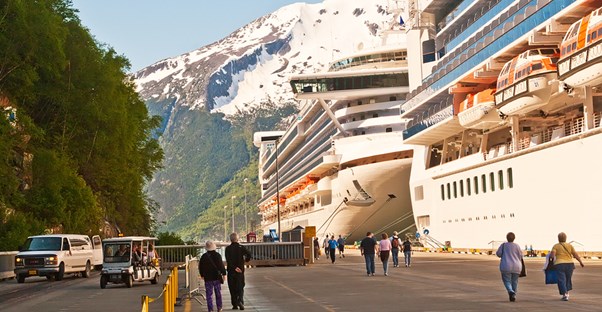 passengers disembark from an Alaskan cruise ship