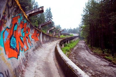 The bobsled track of Sarajevo is now abandoned and covered in graffiti.