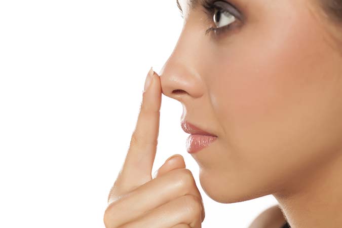 Pointing at Your Nose