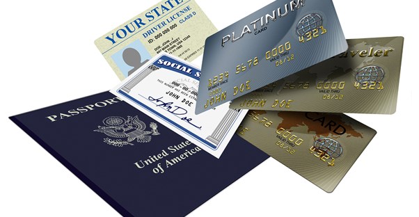 multiple travel credit cards plus various IDs such as a passport and driver's license