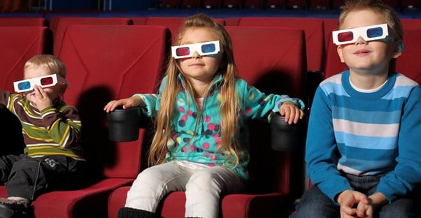 kids put on 3D glasses to view a show in branson missouri