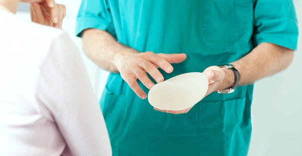 a doctor answering breast augmentation questions