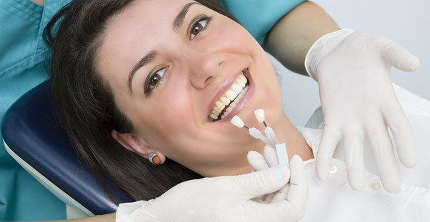 a woman who knows what to expect with dental veneers