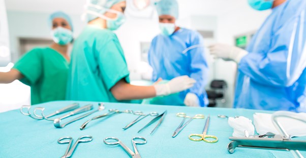 surgeons performing a vasectomy reversal